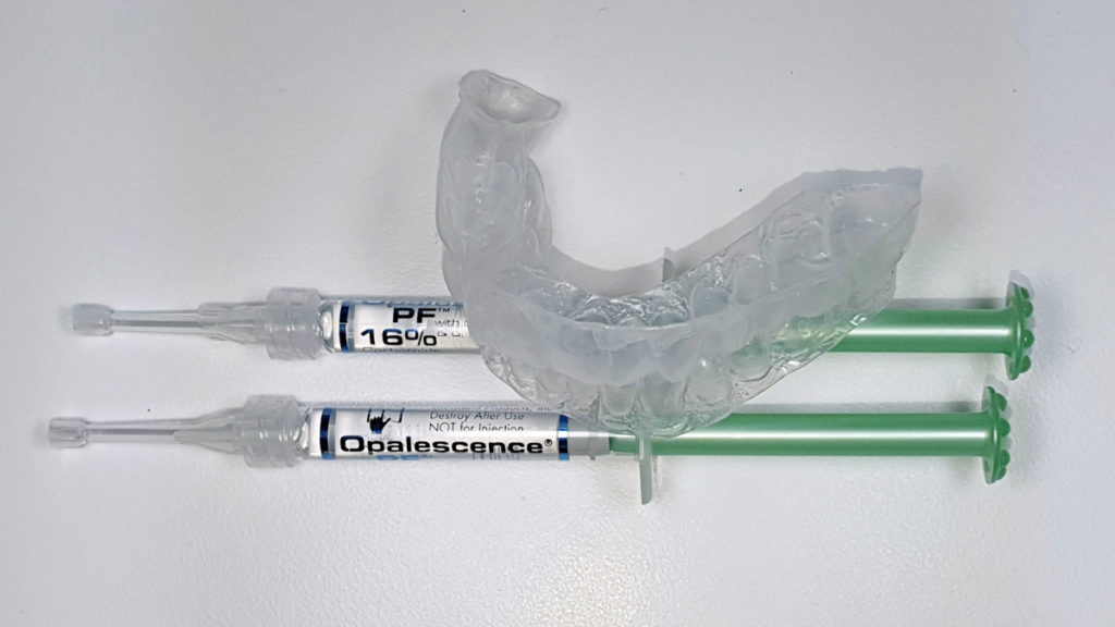 Teeth whitening syringes and mouth piece