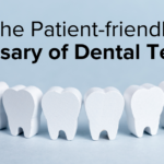 Toy teeth row on blue background.